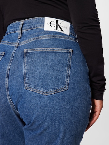 Calvin Klein Jeans Curve جينز واسع جينز بلون أزرق