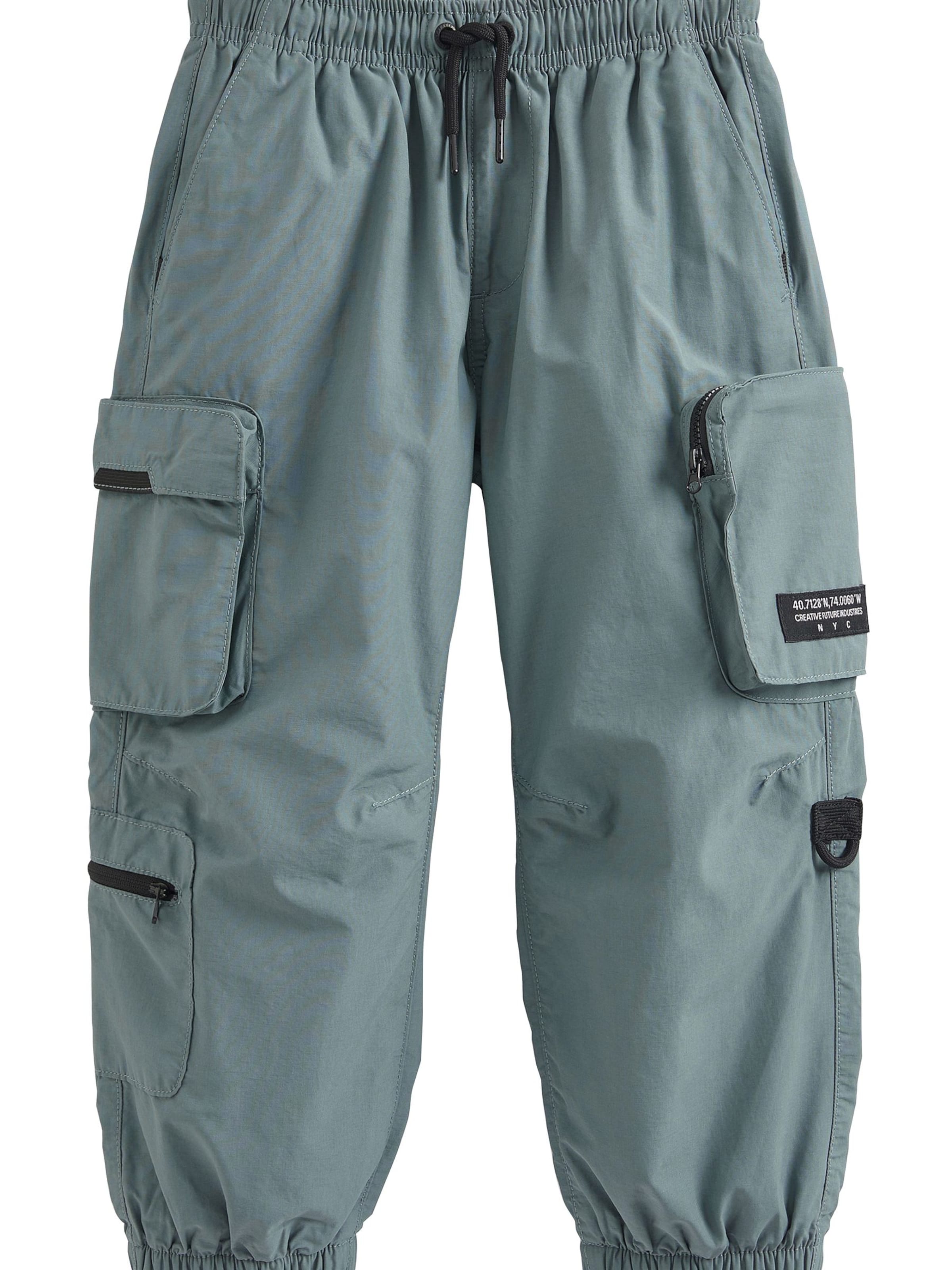 Next Zwężany krój Spodnie w kolorze zielony: przód