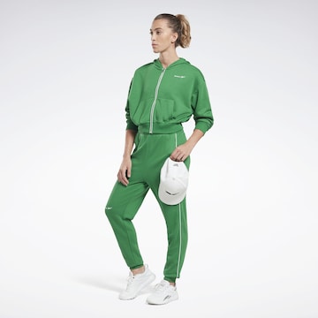 Reebok Úzky strih Športové nohavice - Zelená