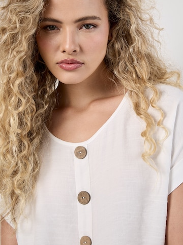 Chemisier ' ' Apricot en blanc