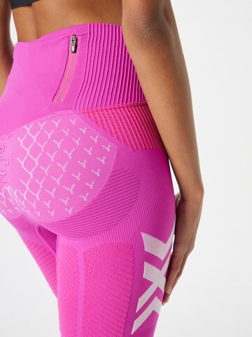 Skinny Pantaloni sportivi di X-BIONIC in lilla