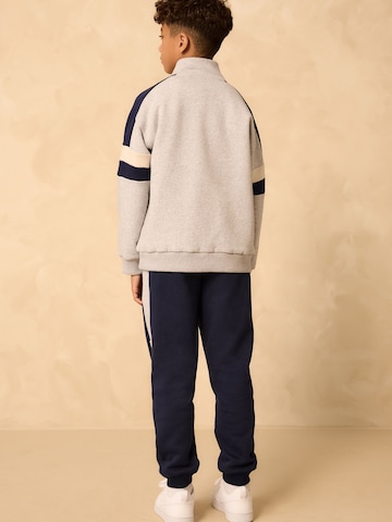 Set Next en gris
