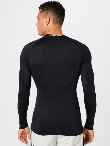 NIKE Regular Fit Funktionsshirt in Schwarz