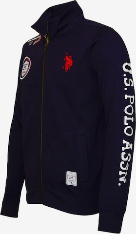 Veste de survêtement U.S. POLO ASSN. en bleu