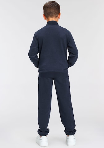 Champion Authentic Athletic Apparel Tracksuit in Blue