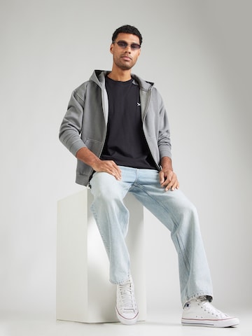 Iriedaily Póló 'Flowing' - fekete