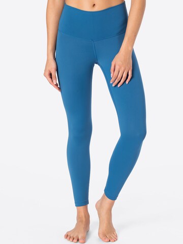 Skinny Leggings 'W NY DF HR YOGA  TGHT' de la NIKE pe albastru: față