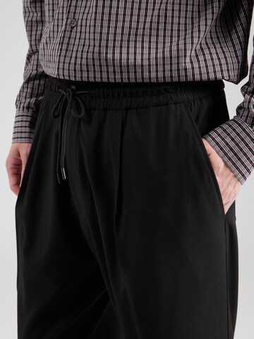 Regular Pantalon à plis 'Ravi243' HUGO en noir
