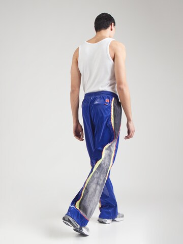 Nike Sportswear Baggy Trousers in Blue