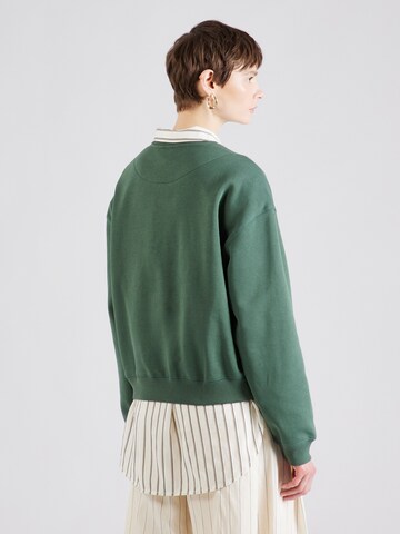 Sweat-shirt 'Essence Standard' WEEKDAY en vert