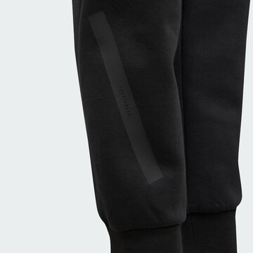ADIDAS SPORTSWEAR Tapered Sports trousers 'Z.N.E.' in Black