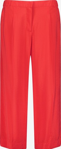 Wide leg Pantaloni con pieghe di SAMOON in rosso: frontale