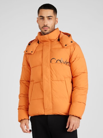 Calvin Klein Jeans Prehodna jakna 'Essential' | oranžna barva: sprednja stran