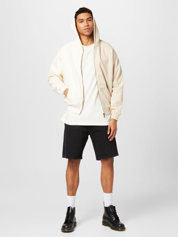 Veste de survêtement Karl Kani en beige