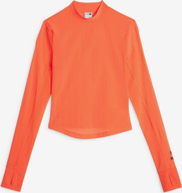 PUMA T-shirt 'DARE TO' i orange: framsida