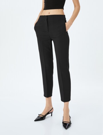 Koton Slim fit Pleated Pants in Black: front