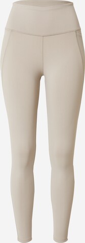 Skinny Pantaloni sportivi 'LUX' di Reebok in beige: frontale