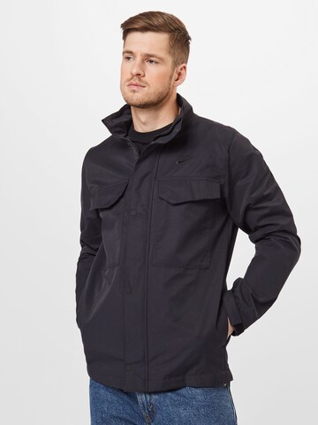 Nike Sportswear Between-Season Jacket in Black: front