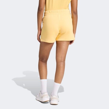 ADIDAS SPORTSWEAR Regular Workout Pants in Yellow