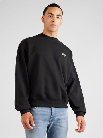 Tommy Jeans Sweatshirt in Zwart: voorkant