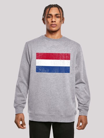 Sweat-shirt F4NT4STIC en gris : devant