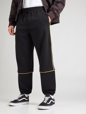 VANS Alt kitsenev Püksid 'Star V', värv must: eest vaates