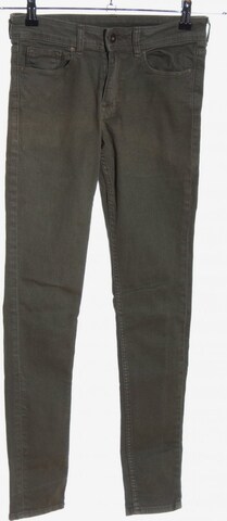 H&M Skinny Jeans 27-28 in Grün: predná strana