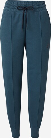 Tapered Pantaloni de la Nike Sportswear pe verde: față