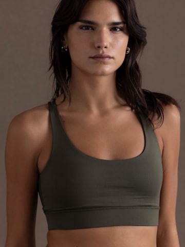 Hey Honey Bustier Sport bh 'Criss Cross' in Groen: voorkant