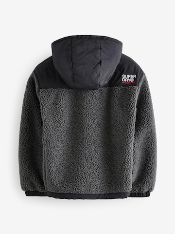 Superdry Välikausitakki värissä musta