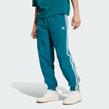 ADIDAS ORIGINALS Tapered Broek in Blauw: voorkant