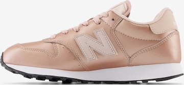 Baskets basses 'GW500' new balance en or