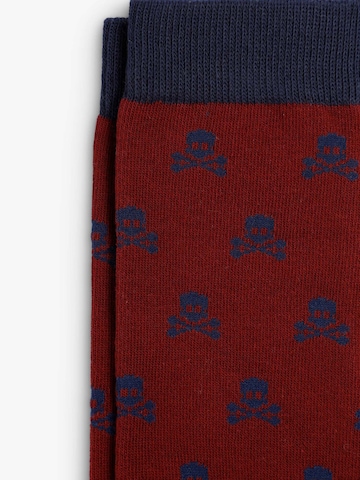 Chaussettes 'Skull' Scalpers en rouge