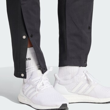 ADIDAS SPORTSWEAR Tapered Sports trousers 'Tiro' in Black