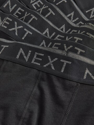 Boxeri de la Next pe negru