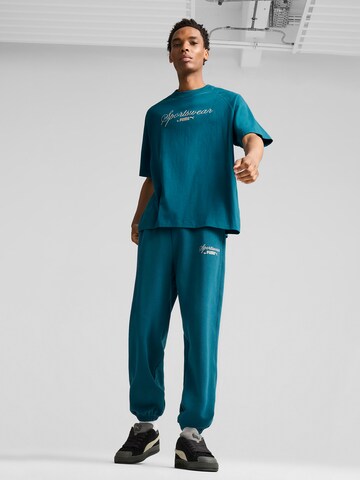 PUMA T-Shirt 'Classics+' in Grün