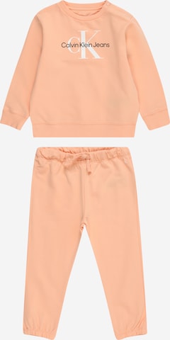 Calvin Klein Jeans Sweatsuit in Orange: front