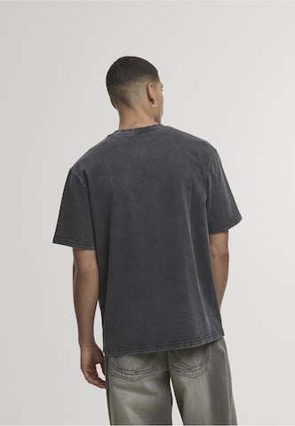 Karl Kani T-Shirt in Schwarz