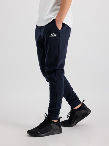 ALPHA INDUSTRIES Tapered Trousers in Blue: front