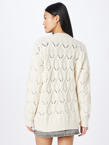 ABOUT YOU Knit cardigan 'Goldie' in Beige