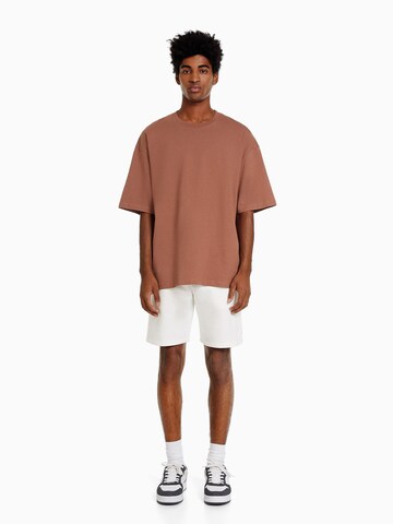 Bershka Regular Shorts in Beige