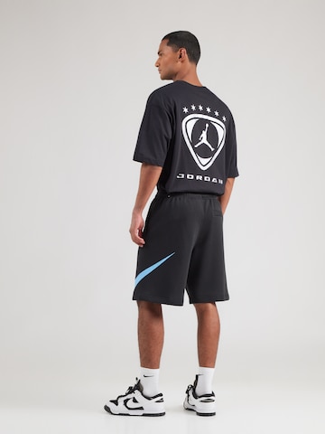 Nike Sportswear Loosefit Παντελόνι 'CLUB' σε μαύρο