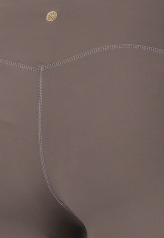 Athlecia Skinny Sportbroek 'Luxe' in Bruin
