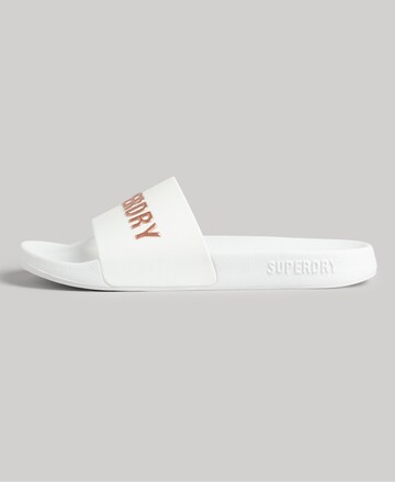 Claquettes / Tongs Superdry en blanc