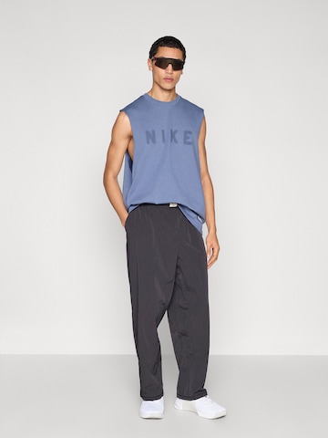 NIKE Wide leg Sportbyxa i svart