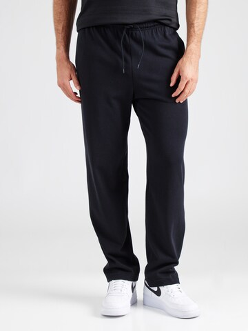 Tapered Pantaloni 'Club' di Nike Sportswear in nero: frontale