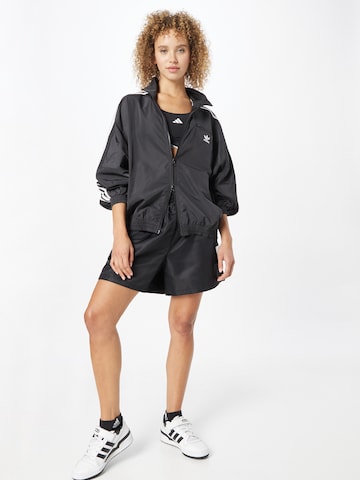 ADIDAS ORIGINALS Prehodna jakna 'Adicolor Classics' | črna barva