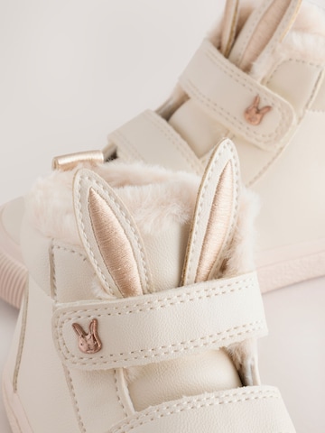 Bottes Next en beige