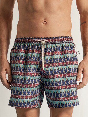 IUMAN Intimissimi Board Shorts in Red: front