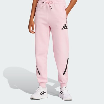 ADIDAS SPORTSWEAR - Tapered Calças de desporto 'Z.N.E.' em rosa: frente